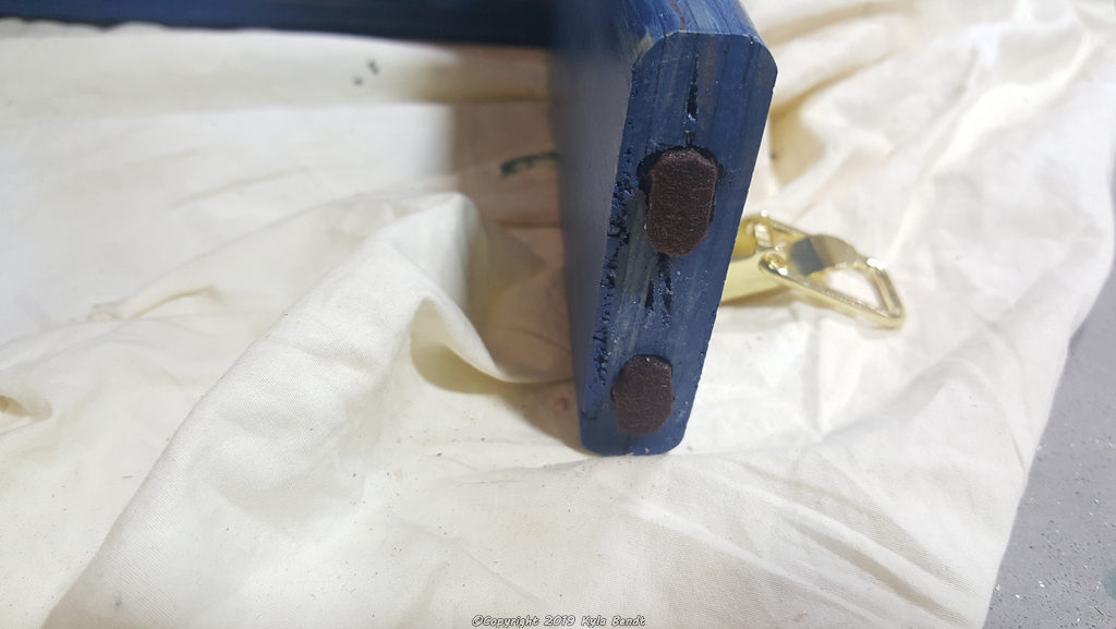 Felt pads on the bottom of a kid's step stool for scratch-free sliding.