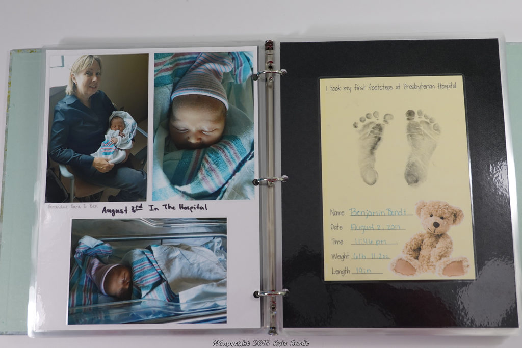 laminated baby book page - footprints from hospital and photos from hospital