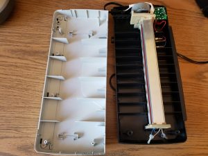 taking apart a laminator to remove a jammed paper